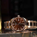 Tissot PR 100 Brown Dial Gold Steel Strap Watch for Women - T150.210.33.291.00