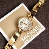 Michael Kors Laney Silver Dial Gold Steel Strap Watch for Women - MKO1110